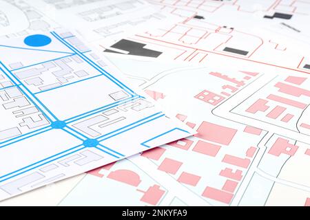 Many different cadastral maps as background, closeup Stock Photo