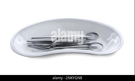 Surgical instruments in kidney dish on white background Stock Photo