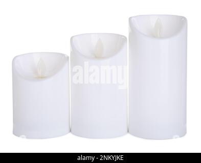 Decorative flameless LED candles on white background Stock Photo