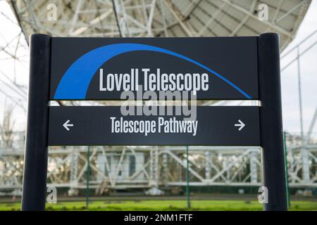 Tourist information sign and the giant Lovell radio telescope at Jodrell Bank site, Cheshire, UK. The frame supporting the dish is seen clearly from behind / reverse / side. (133) Stock Photo