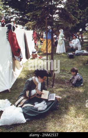 Old time rifleman's meet, june 24, 1973, is held on the Greenfield Village green adjoining the Henry Ford Museum of Dearborn. Red coats identify the 'British army contingent' at the match Stock Photo