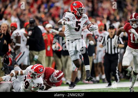 Indianapolis, United States. 10th Jan, 2022. Georgia Bulldogs defensive  back Kelee Ringo (5) breaks up an end zone pass intended for Alabama  Crimson Tide wide receiver Agiye Hall (84) during the second