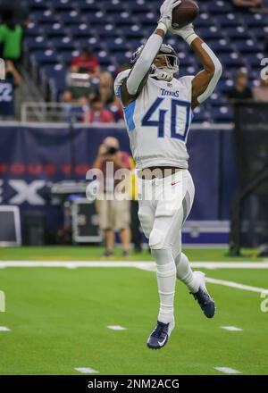 Houston, TX, USA. 9th Jan, 2022. Tennessee Titans running back D'Onta  Foreman (7) carries the ball while taking a hit from Houston Texans outside  linebacker Kamu Grugier-Hill (51) during the 4th quarter