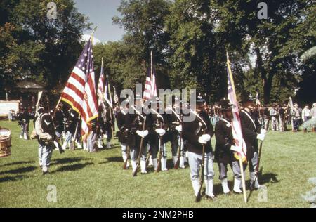 1970s America: Old time rifleman's meet, June 24, 1973, is held on the Greenfield Village green adjoining the Henry Ford Museum of Dearborn Stock Photo