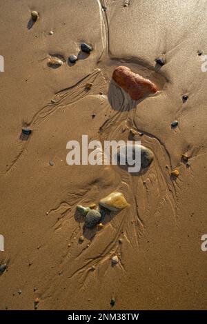 Sand and pebbles the beach at Porth Neigwl bay also known as Hells mouth on the Llyn Peninsula near Llanengan North Wales. Stock Photo