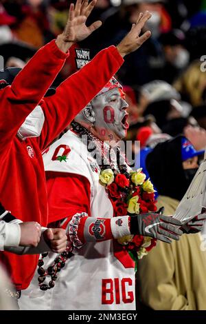 January 1, 2022 Pasadena, CA.Ohio State Buckeyes wide receiver Marvin  Harrison Jr. #18 catches the pass and runs as Utah Utes cornerback Kenzel  Lawler #2 defends in action during the third quarter