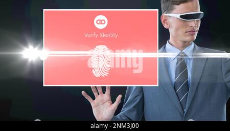 Composition of businessman with vr glasses touching screen with biometric fingerprint. global online identity and digital interface concept digitally Stock Photo
