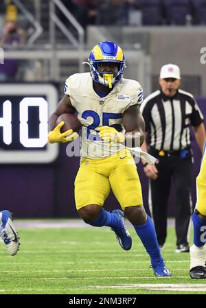 MINNEAPOLIS, MN - DECEMBER 26: Los Angeles Rams Quarterback Matthew  Stafford (9) under center during a game between the Minnesota Vikings and  Los Angeles Rams on December 26, 2021, at U.S. Bank