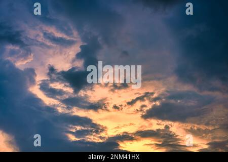 Beautiful dramatic colorful sunset sky with clouds Stock Photo