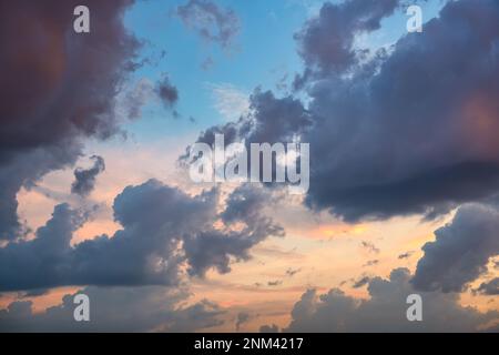 Beautiful dramatic colorful sunset sky with clouds Stock Photo
