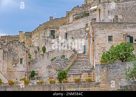Houses in the Sassi di Matera complex of cave dwellings in the ancient town of Matera, capital city in Basilicata, Southern Italy Stock Photo