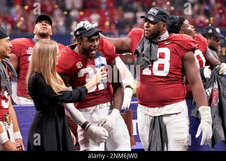 CBS Sports sideline reporter Jamie Erdahl interviews Alabama linebacker  Will Anderson Jr. (31) and defensive lineman Phidarian Mathis (48)  following the Southeastern Conference championship NCAA college football  game against Georgia, Saturday