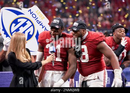 Alabama quarterback Bryce Young (9) thanks CBS' Jamie Erdahl after a  post-game interview follow …