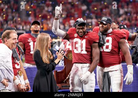 CBS Sports sideline reporter Jamie Erdahl interviews Alabama linebacker  Will Anderson Jr. (31) and defensive lineman Phidarian Mathis (48)  following the Southeastern Conference championship NCAA college football  game against Georgia, Saturday, Dec.