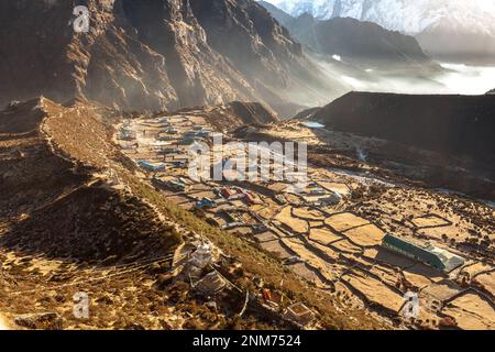 Amazing view over mountain village Thame in Sagarmatha national park, Himalayas, Nepal. Idyllic asian village in mountain gorge. Sunrise scenery of Th Stock Photo