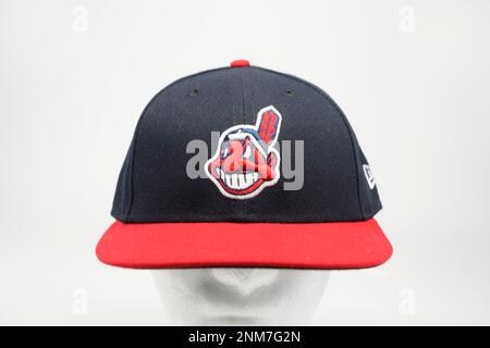 A Cleveland Indians baseball cap with a Chief Wahoo logo, Thursday, Dec. 2,  2021. The mascot logo was used by the Indians (Guardians) from 1951-2018.  Photo via Credit: Newscom/Alamy Live News Stock