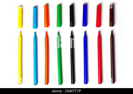 Many felt-tip pens in a row on a white background Stock Photo