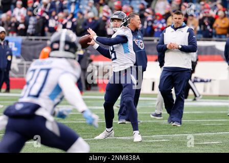 Tennessee Titans quarterback Kevin Hogan (18) runs onto the field