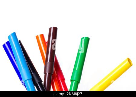 Markers of different colors on a white background. Stock Photo