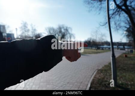 Brest, Belarus - February 12, 2023: Urban lifestyle photography. The pointing finger of a child's hand Stock Photo