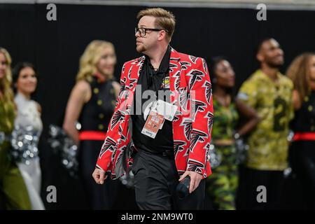 ATLANTA, GA - NOVEMBER 18: Falcons mascot Freddie shoots t-shirts into the  crowd before the Thursday night NFL game between the Atlanta Falcons and  the New England Patriots on November 18, 2021