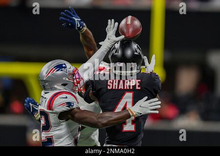 ATLANTA, GA – NOVEMBER 18: Atlanta free safety Erik Harris (23) gets  low-five from Freddie the Falcon prior to the start of the NFL game  between the New England Patriots and the