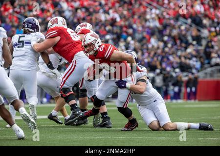 Brady Schipper of the Wisconsin Badgers runs with the ball against