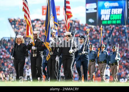 DENVER, CO - NOVEMBER 14: Denver Broncos running back Javonte Williams (33)  rushes during a game between the Denver Broncos and the Philadelphia Eagles  at Empower Field at Mile High on November