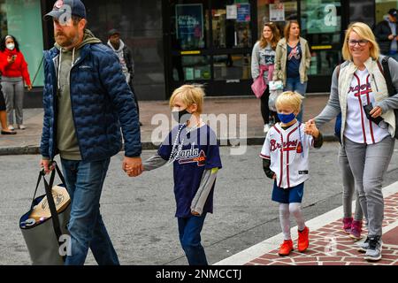 ATLANTA, GA - NOVEMBER 05: Ozzie Albies #1 of the Atlanta Braves and his  girlfriend Andrea during the Celebration at Truist Park on November 5, 2021  in Atlanta, Georgia. (Photo by David