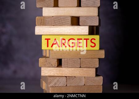 Word TARGET on wooden cubes on white background. Stock Photo