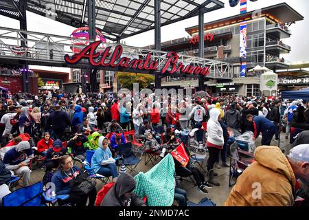 ATLANTA, GA - AUGUST 21: Fans mill at The Battery Atlanta just outside the  right field gate prior to the Sunday afternoon MLB game between the Houston  Astros and the Atlanta Braves