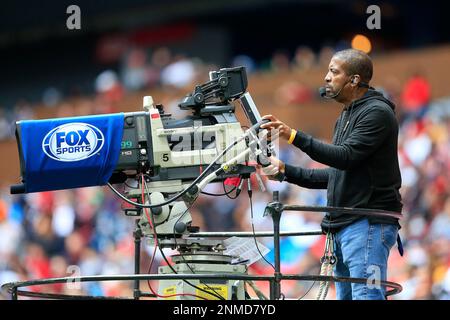 A FOX Sports television camera operator works from a mobile elevated  position during the first half of an NFL football game between the  Jacksonville Jaguars and the Atlanta Falcons, Sunday, Nov. 28, 2021, in  Jacksonville, Fla. (AP Photo/Phelan M