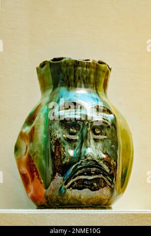 A folk face vase created by Mississippi master potter George Ohr in 1895 is displayed at Ohr-O’Keefe Museum of Art in Biloxi, Mississippi. Stock Photo