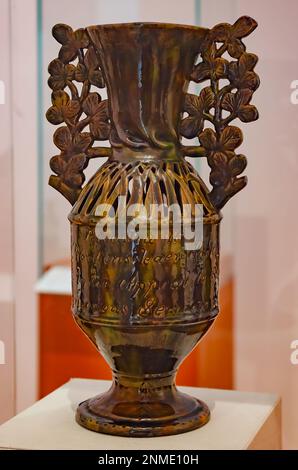 A winged vase created by Mississippi master potter George Ohr in 1899 is displayed at Ohr-O’Keefe Museum of Art, Feb. 22, 2023, in Biloxi, Mississippi. Stock Photo