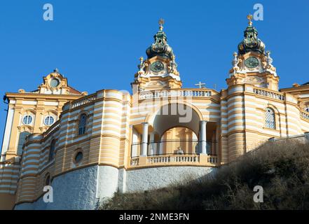 The sunny view of 18th century historic Melk Abbey with two clock towers in Melk town (Austria). Stock Photo