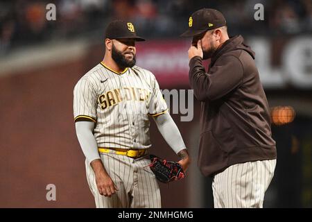 San Diego Padres pitching coach Ruben Niebla walks back to the dugout  during a baseball game against the Pittsburgh Pirates Tuesday, July 25,  2023, in San Diego. (AP Photo/Derrick Tuskan Stock Photo 