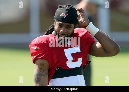 TAMPA, FL - SEP 29: Newly signed Tampa Bay Buccaneers defensive back  Richard Sherman (5) rubs his head during the Tampa Bay Buccaneers work out  on September 29, 2021 at the AdventHealth