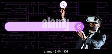Businessman in black office suit standing wearing VR glasses and looking at technological message. Man pressing virtual buttons with his both fingers Stock Photo
