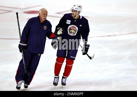 Florida Panthers head coach Joel Quenneville skates during the