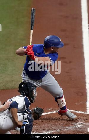 ST. PETERSBURG, FL - MAY 15: Toronto Blue Jays catcher Alejandro Kirk (30)  celebrates his double with his teammates in the dugout during the MLB  regular season game between the Toronto Blue