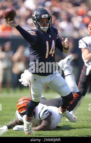 CHICAGO, IL - SEPTEMBER 19: Cincinnati Bengals Quarterback Joe Burrow (9)  is tackled by Chicago Bears Nose Tackle Khyiris Tonga (95) and Chicago Bears  Linebacker Khalil Mack (52) during a game between