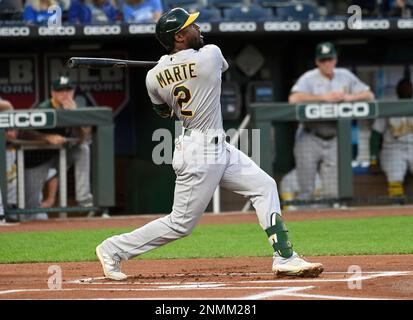 Oakland Athletics center fielder Starling Marte, left, and shortstop Elvis  Andrus, collide going after a fly ball hit by Chicago White Sox's Jose  Abreu in the ninth inning of a baseball game