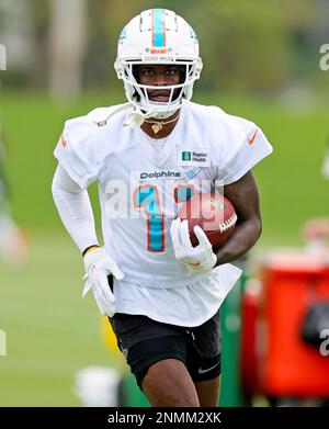 DeVante Parker of the Miami Dolphins runs a drill during practice at