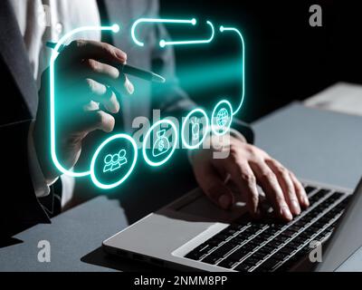 Man sitting at the table with laptop. Big white speech bubble for text overhead. Empty Dialog box on bright colored background. drawing illustration. Stock Photo