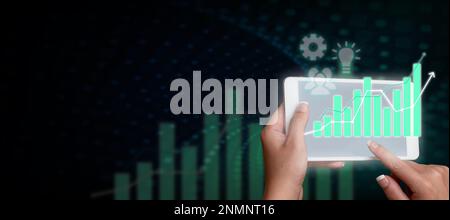Two Hands Holding mobile phone and press on screen. Cellphone presenting New Futuristic Technologies. Palms Carrying cellphone Displaying Late Stock Photo