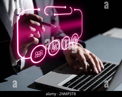 Man sitting at the table with laptop. Big white speech bubble for text overhead. Empty Dialog box on bright colored background. drawing illustration. Stock Photo