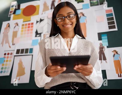 Fashion, designer with Indian woman and tablet, smile with technology with digital design, workshop or atelier. Happy, creative with professional Stock Photo