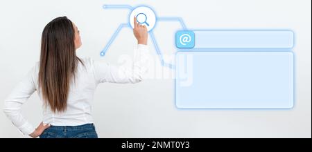 Businesswoman in white office sirt standing and pressing virtual button with her finger. Women presenting new technologies for future. Futuristic Stock Photo