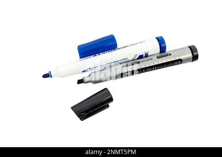 Black and blue markers with cap off on a white background Stock Photo
