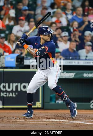 Houston Astros shortstop Carlos Correa hoists the World Series championship  trophy as he walks on the st…